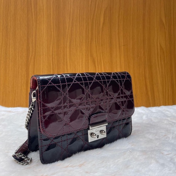 Dior Handbags - Christian Dior patent leather cannage bag in wine and black